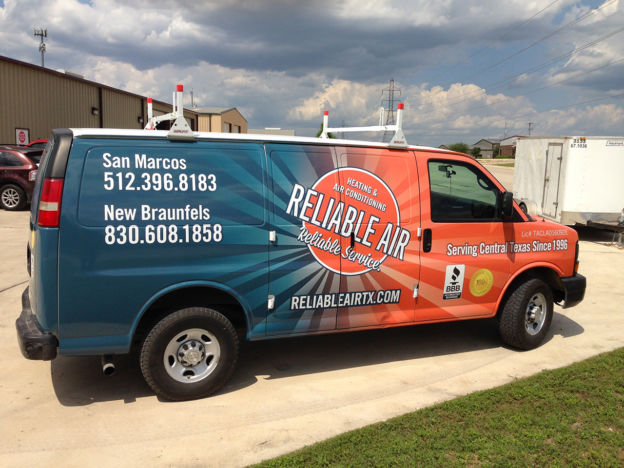Reliable Air branded service truck parked outside