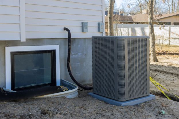 Outdoor AC unit in a backyard